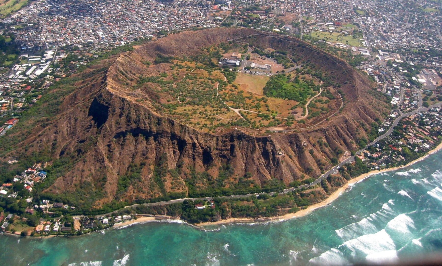 Aerial view of Lēʻahi (Diamond Head) crater above the reef-fringed shore