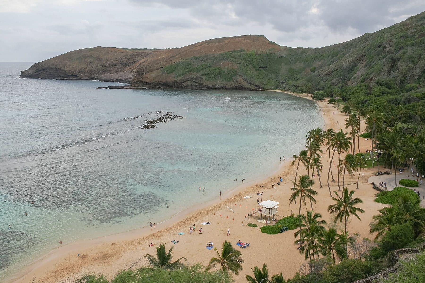 Hanauma Bay’s reef-filled crater bay and palm-lined beach