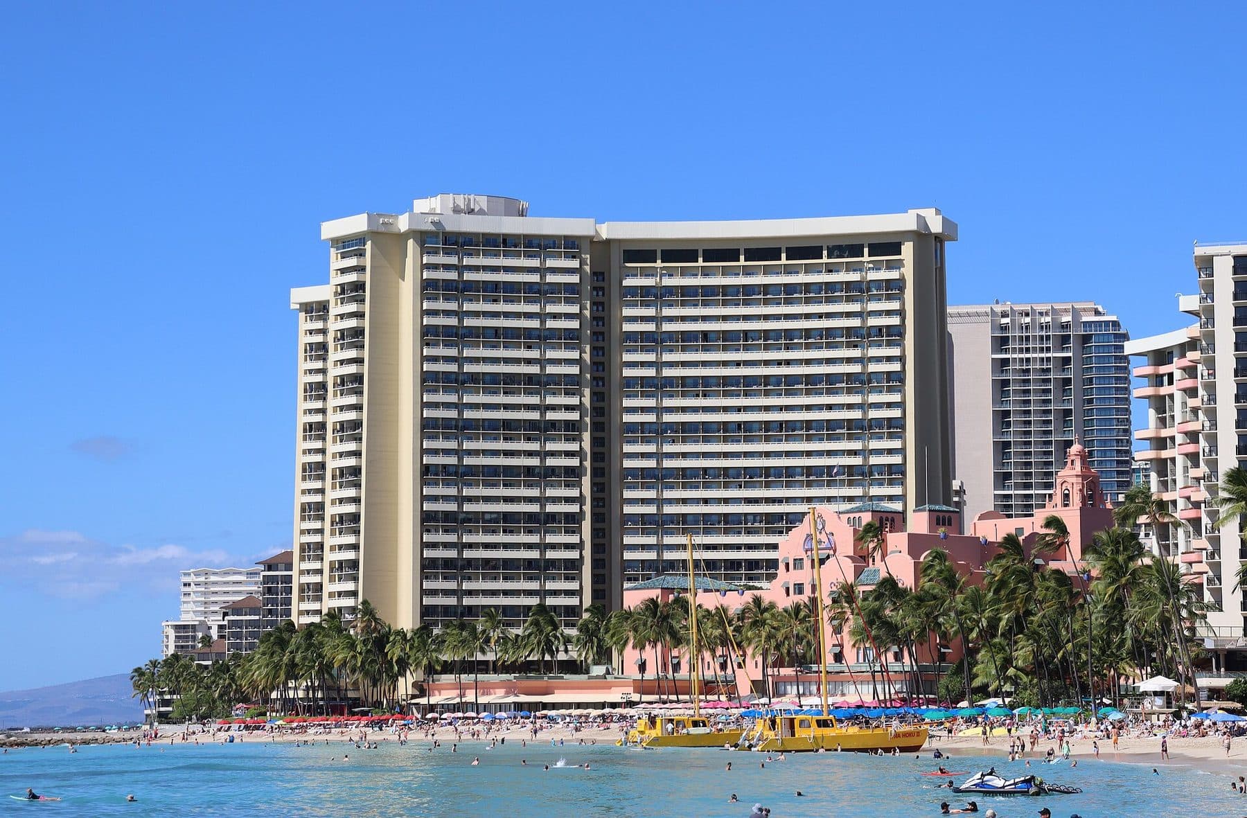 Sheraton Waikiki and the pink Royal Hawaiian hotel on Waikīkī Beach