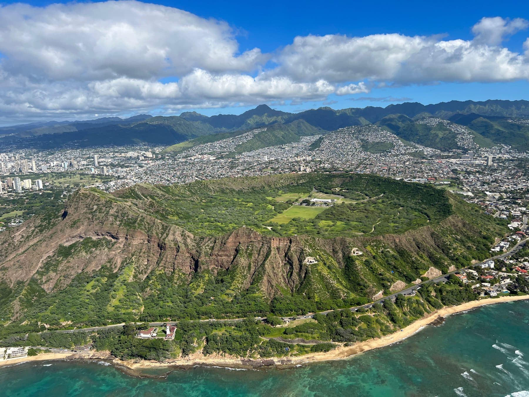 Lēʻahi (Diamond Head) crater and Honolulu seen from a helicopter