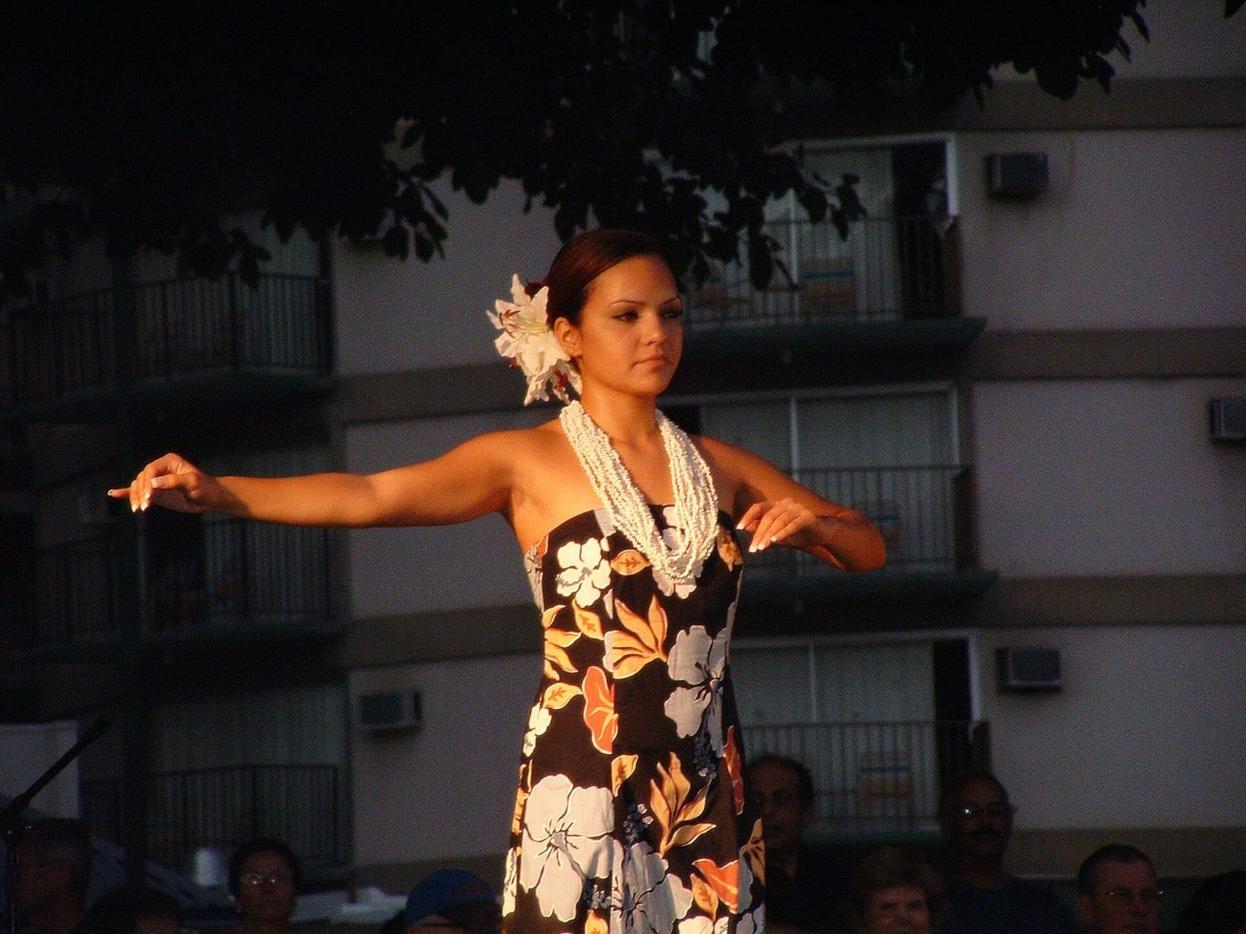 Hula dancer performing at the Kūhiō Beach hula show in Waikīkī